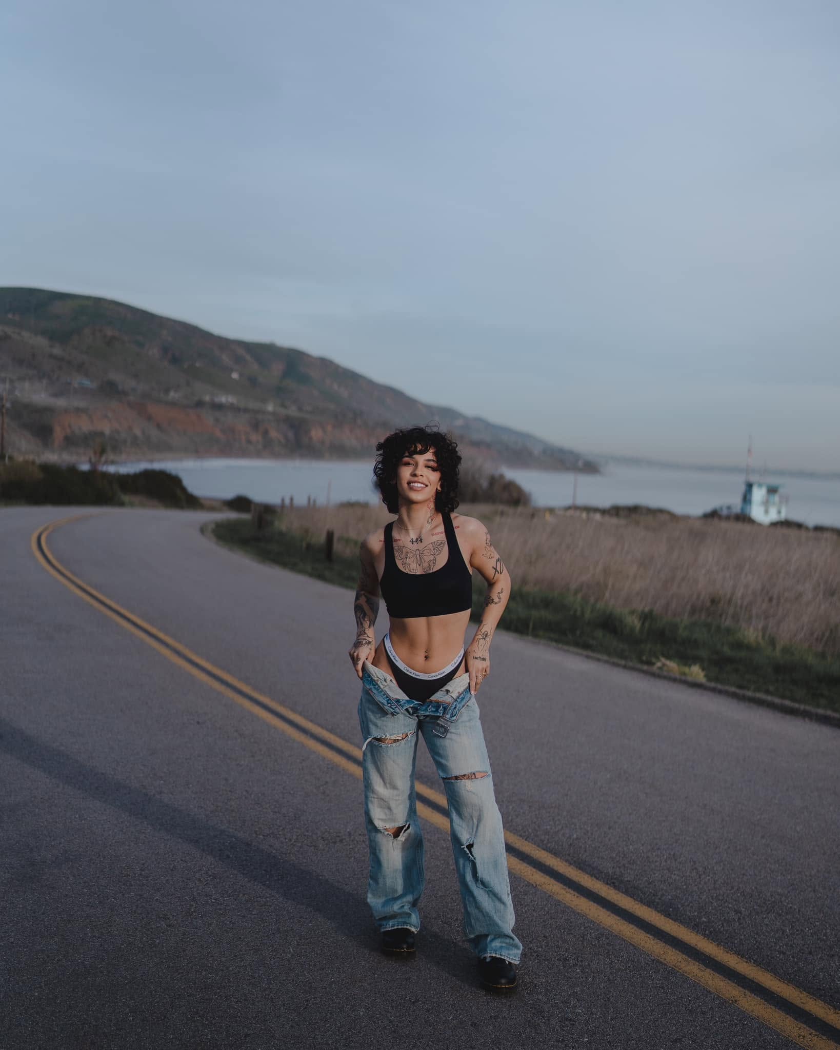 Lifestyle portrait on a coastal road